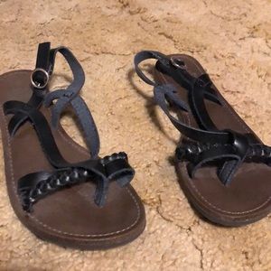 Brown and black sandals